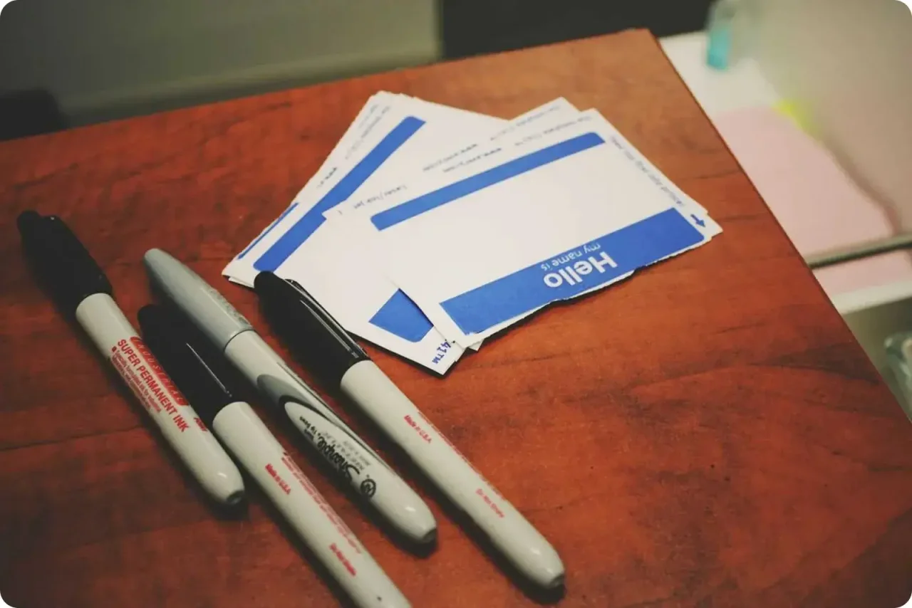 Name Tags And Markers On Table